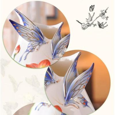 BÌNH THỦ CÔNG ĐẮP NỔI BƯỚM VÀ HOA